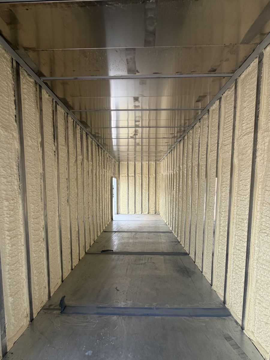 Unit interior with closed-cell spray foam insulation and steel framing