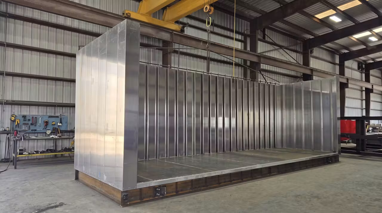 Steel modular enclosure in fabrication under NAM oversight
